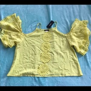 Yellow off shoulder shirt
